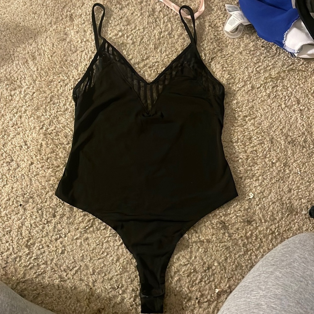 Black mesh body suit